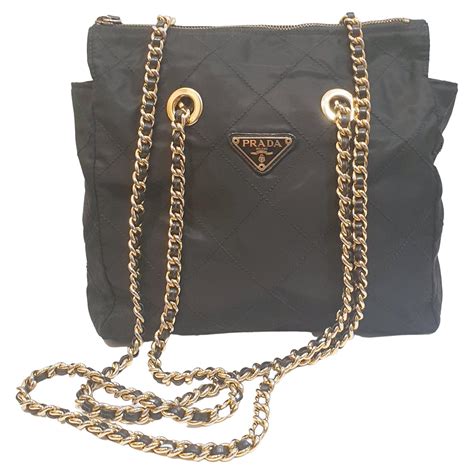 black and gold prada bag|prada black shoulder bag.